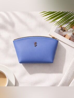 🛍️ JUICY COUTURE blue rubber zip makeup bag